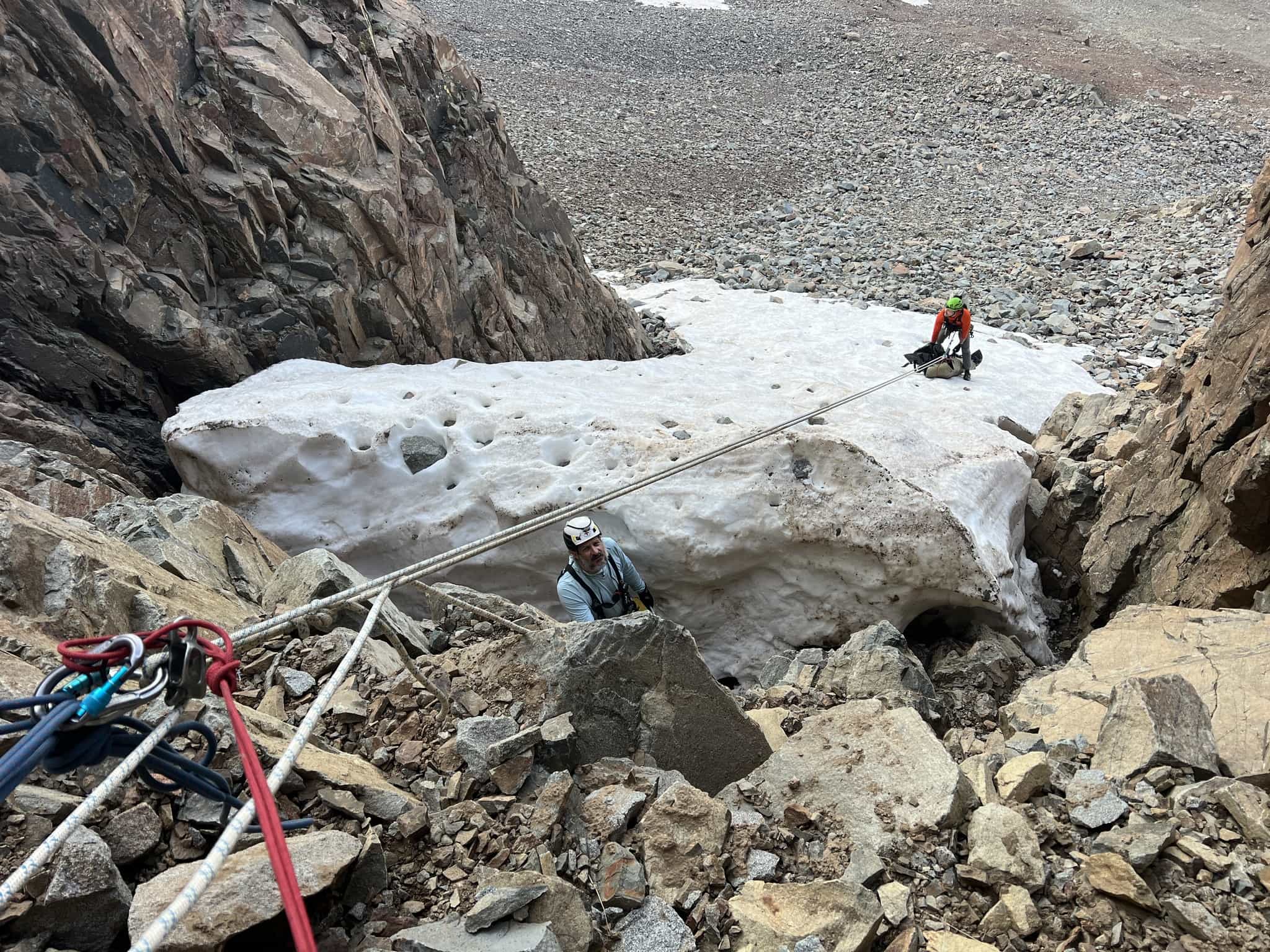 Rescuers retrieve the body of the fallen climber. Credit: San Miguel Sheriff's office