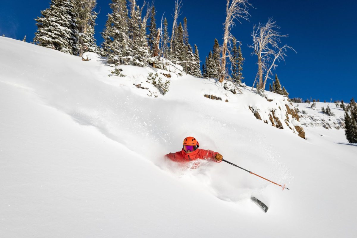 Skier in deep powder at Jackson Hole Mountain Resort