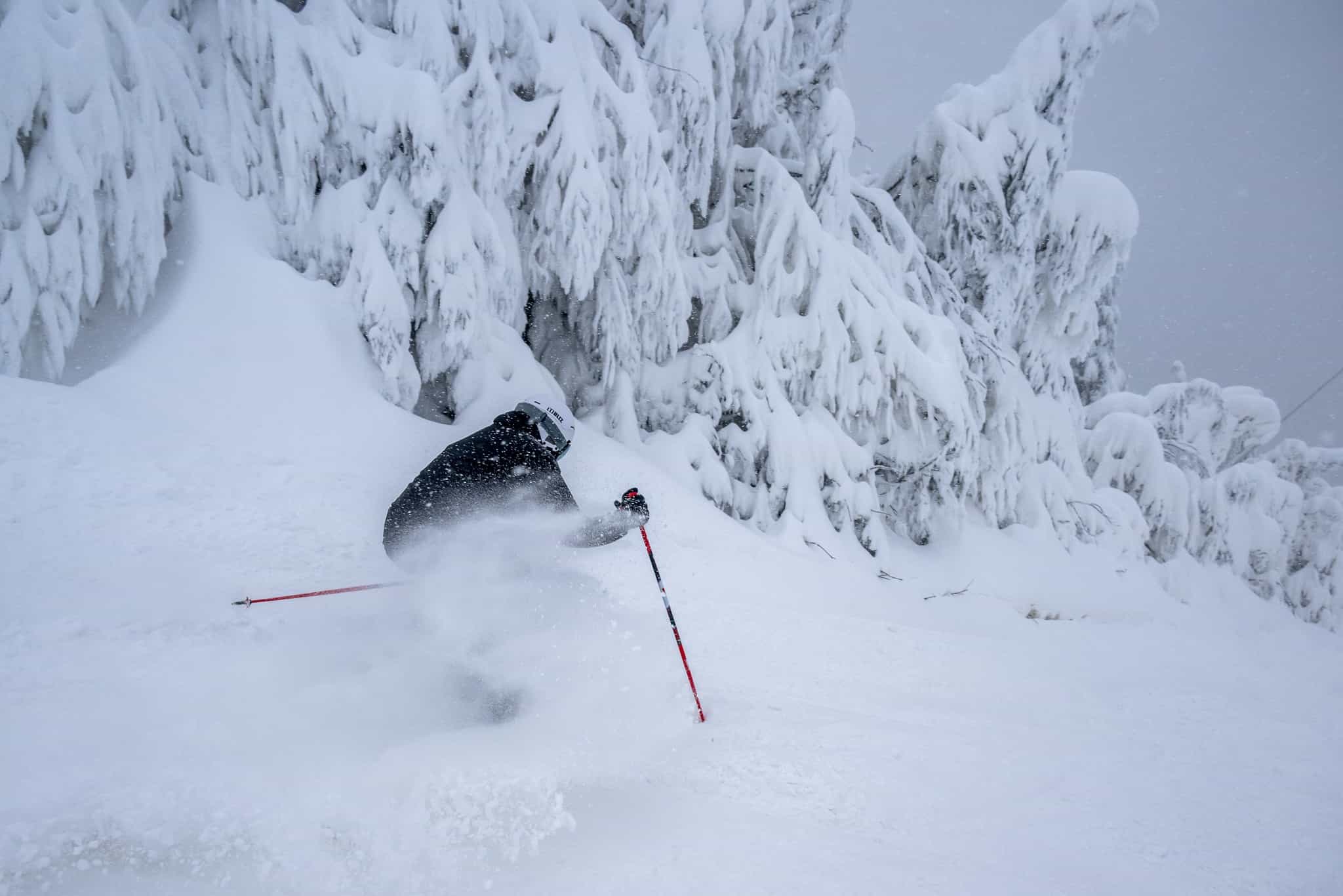 skier in deep snow at Mont tremblant in Quebec Canada, snowiest east coast resorts