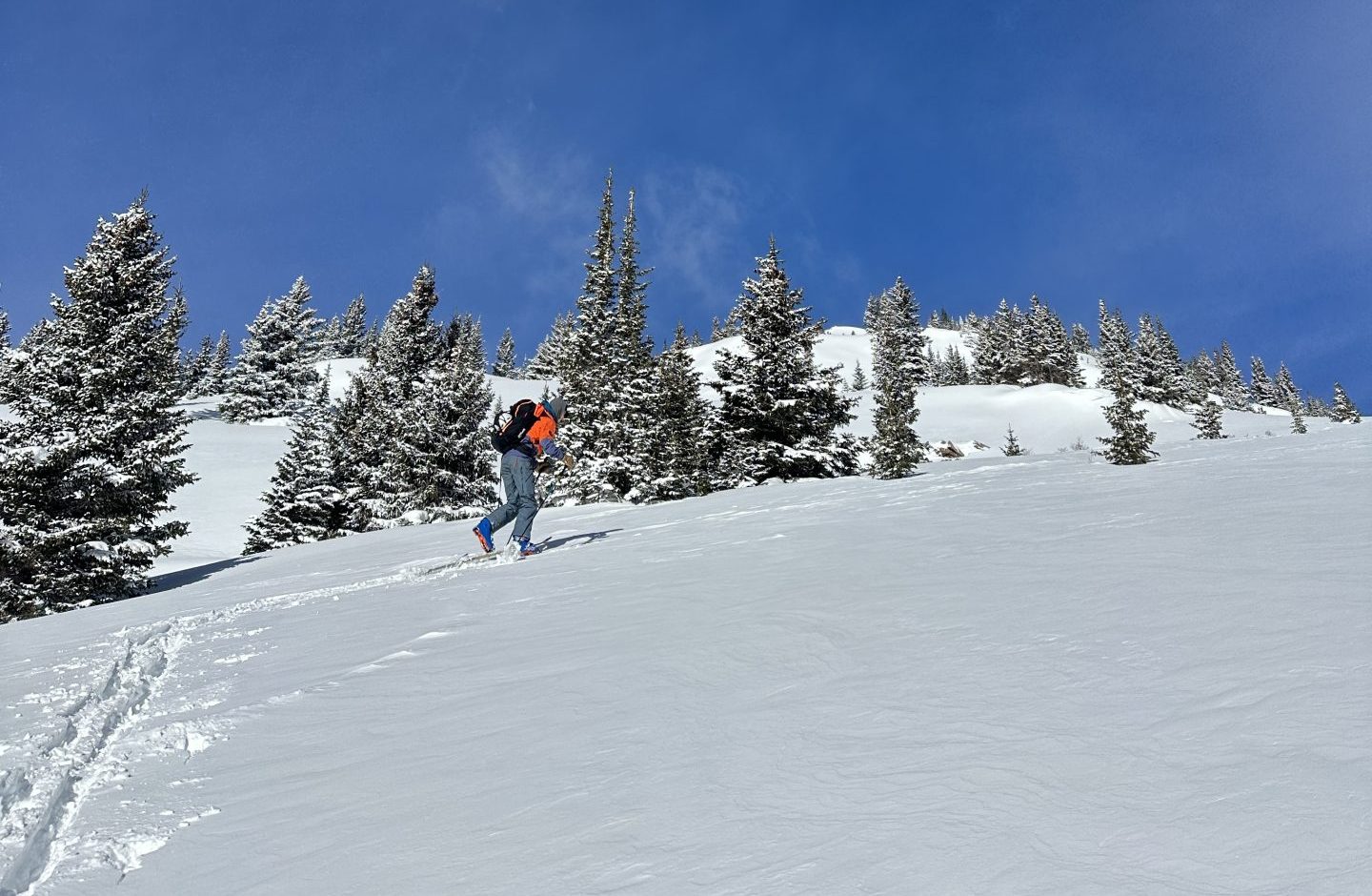Pushing up the skin track. Photo Credit: SnowBrains