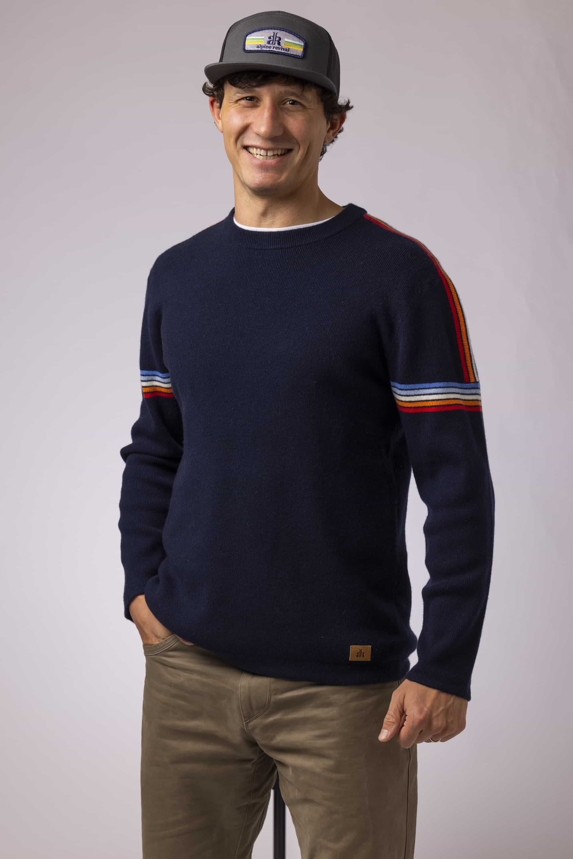 Explore their full range of sweaters, hoodies, beanies, and more. | Photo: Alpine Revival