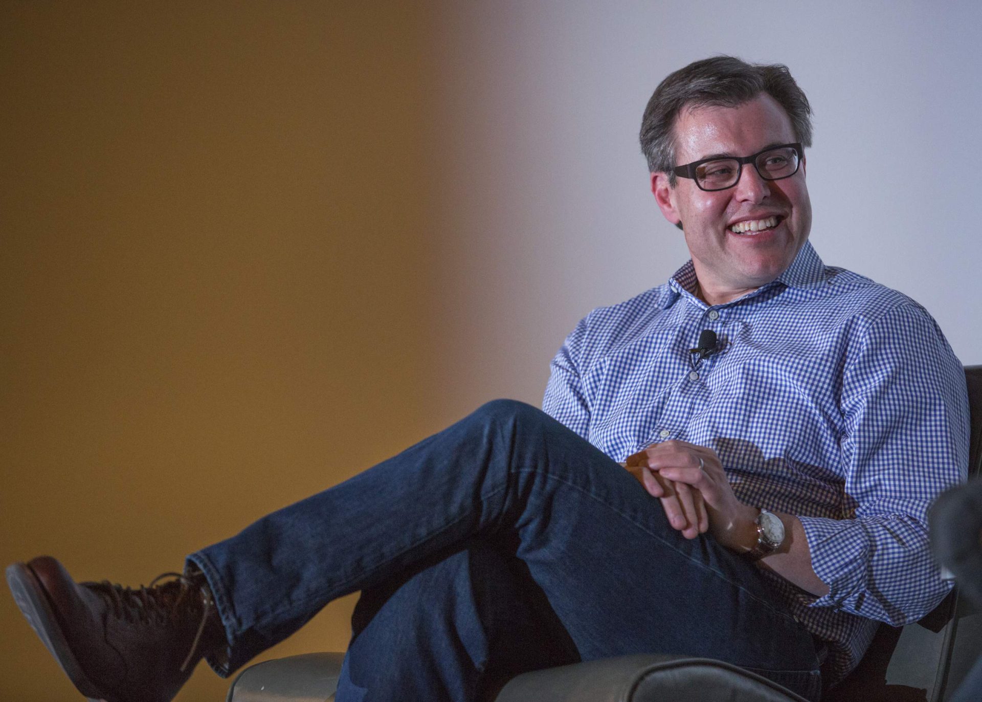 image of rob katz sitting with one leg crossed